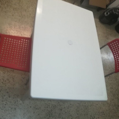 Plastic veranda table used, 100x66x73 cm
