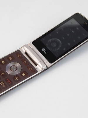 LG Wine Smart 2 H410 used brown flip phone with 3.2" touch screen