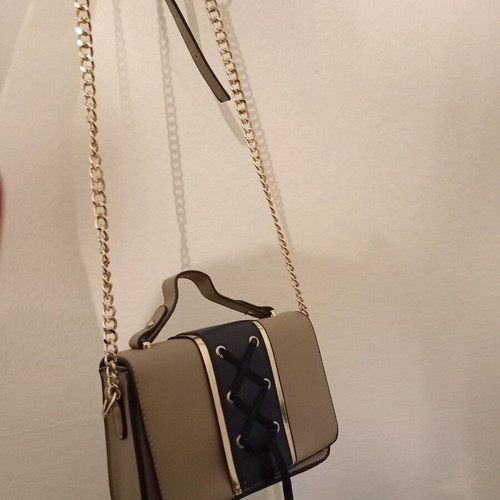Nude shoulder and hand bag with blue and gold chain like new