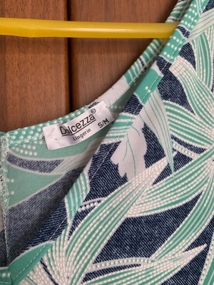 Beach dress with floral print like new, white and green, size M