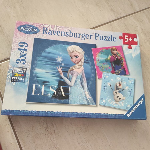 Frozen puzzle set like new with Ravensburger and Trefl