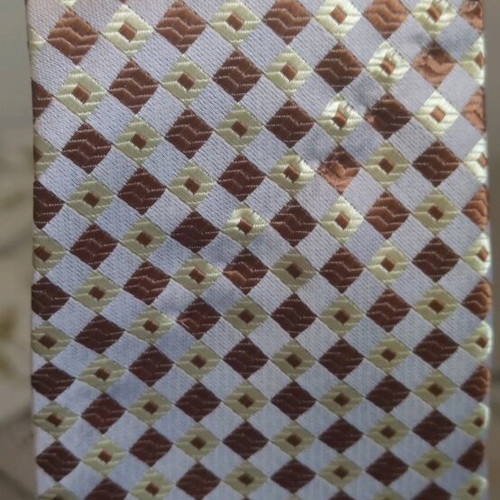 Silk tie new with diamond pattern in gray, brown, and green