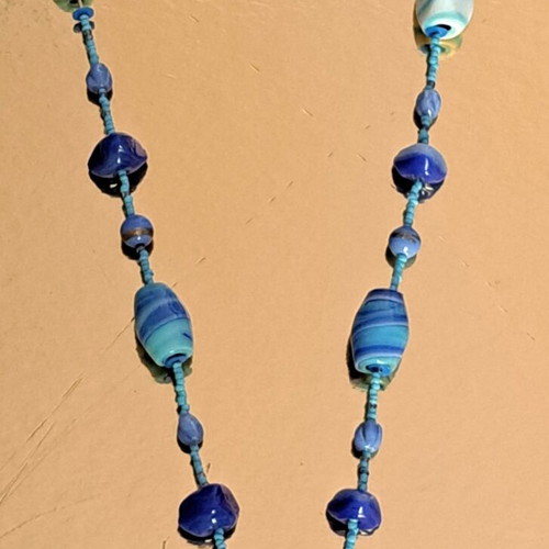 Long necklace like new with blue and purple glass and ceramic stones
