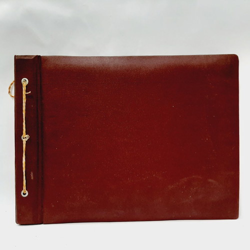 Vintage photo album with brown embossed fabric and embroidery, 35 leaves