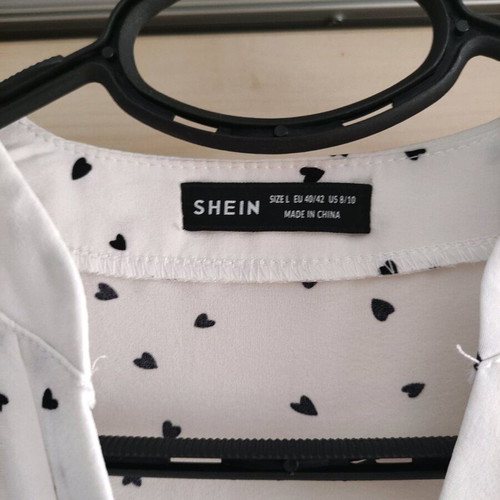 White Shein blouse like new with black hearts size L