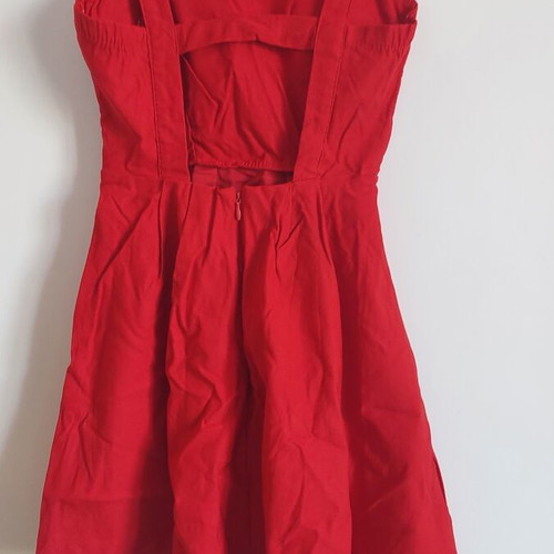 Red sleeveless dress like new, short with open back and chest padding