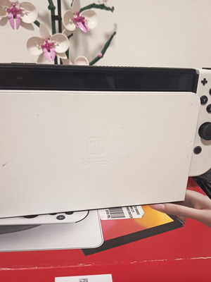 Nintendo Switch with three games