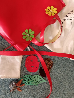 Lamarthe red leather handbag like new with straps and decorative accessories