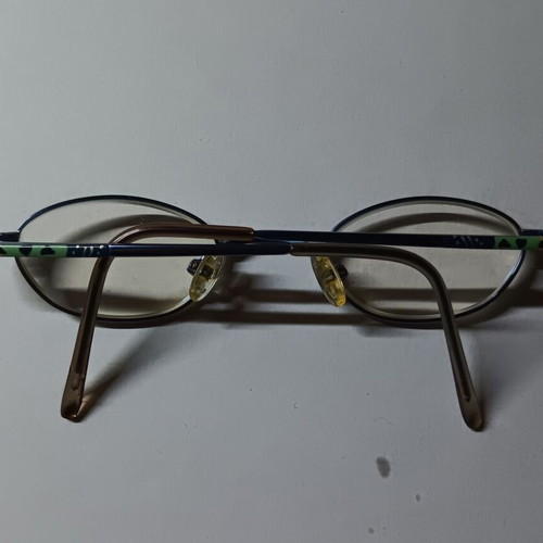 Oval children's eyeglasses used with black case