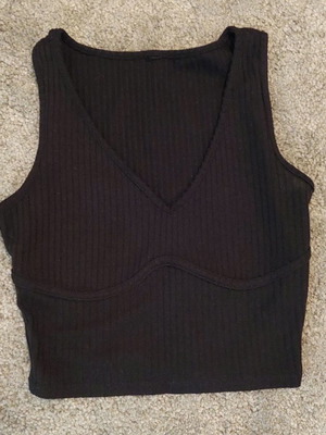 Black crop top with open neckline used, size S