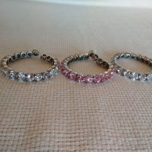 Set of three tennis bracelets like new, pink and white
