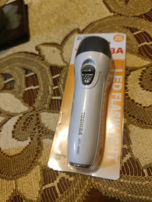 Toshiba flashlight new, operates with AAA batteries