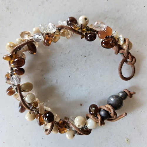 Women's bracelet with stones like new, beige and brown
