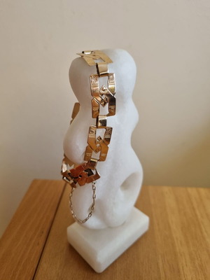 Gold 14k bracelet like new with geometric embossed elements