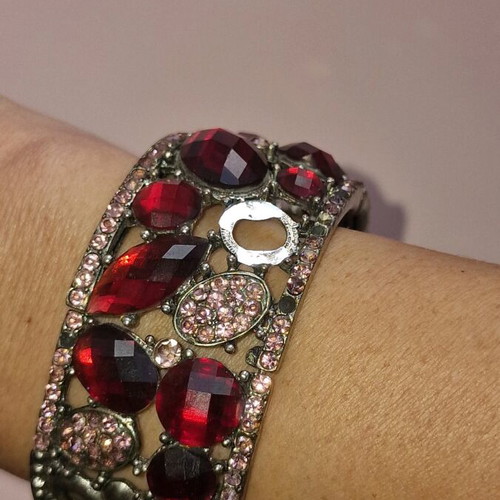 Bracelet used with pink and red stones, some stones missing