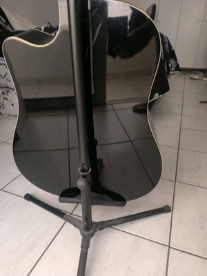 Guitar used, needs string replacement and cleaning