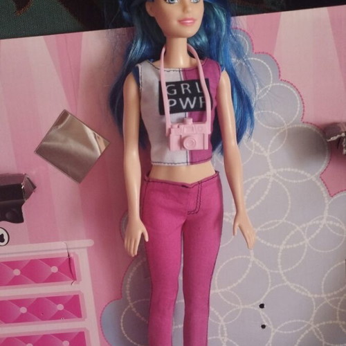 Barbie doll with blue hair