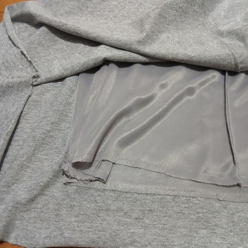 Dress gray silver with V neckline and bow tie at waist size Medium like new