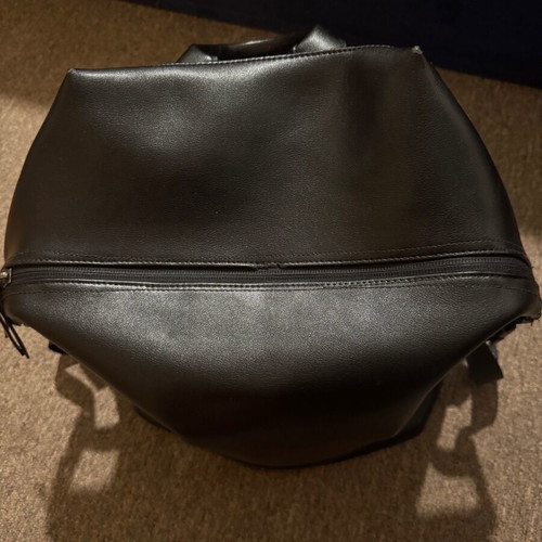Leather backpack like new, black with orange lining