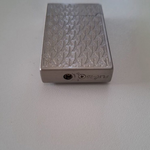 Gas lighter with Eiffel Tower design, like new