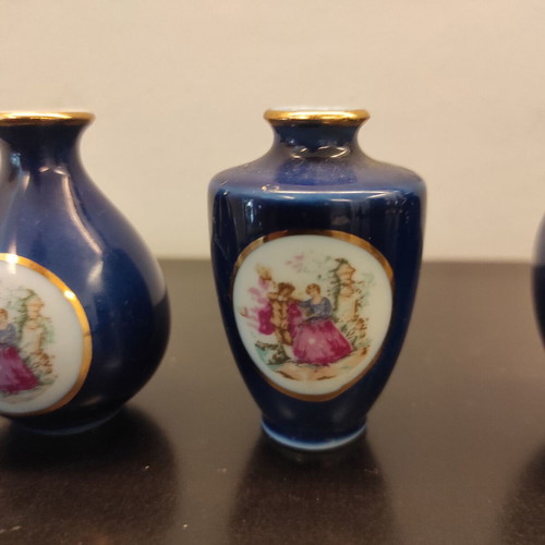 Porcelain decorative small vases like new, set of 5 pieces