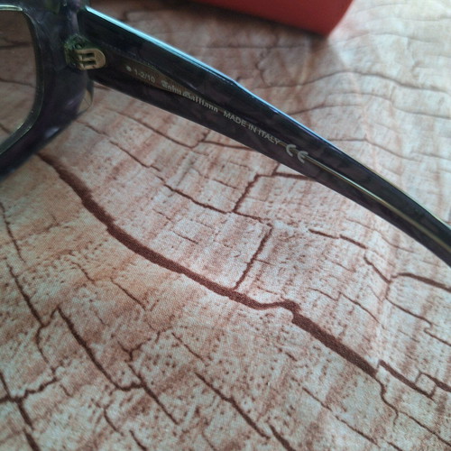 John Galliano sunglasses used, distinctive purple