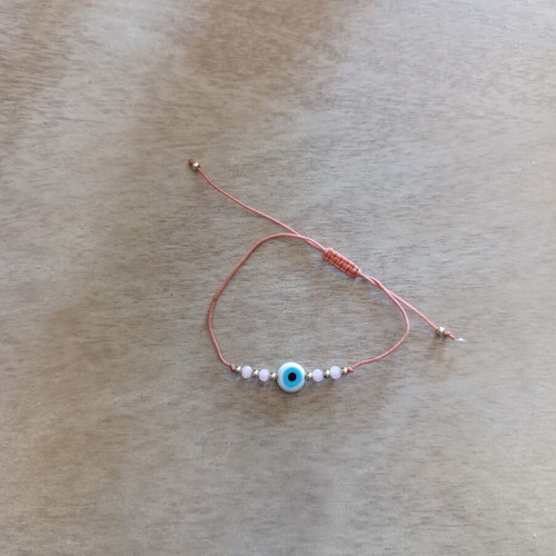 Gold and pink evil eye bracelet like new