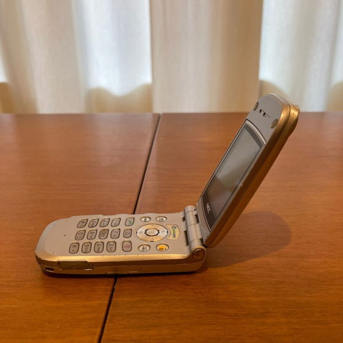 NEC 410i mobile phone used with charger and handsfree
