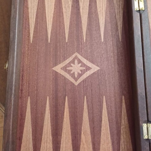 Wooden backgammon new with its pieces
