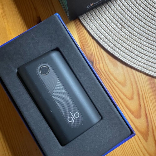 Glo Hyper Starter Kit used with cleaning brush and USB-C cable