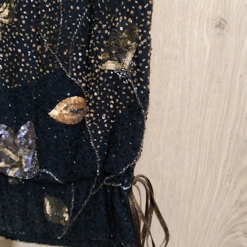 Embroidered top used, size small, black with beads and sequins