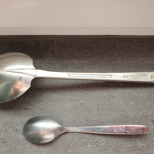 Collectible airline company spoons and knife used