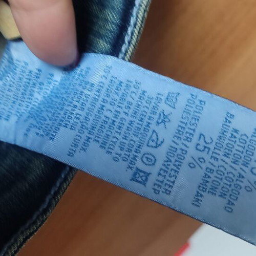 Bershka No 40 Flared Jeans like new, blue with greenish-brown shades