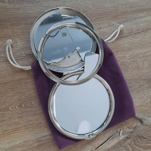 Compact mirror for bag used with purple velvet pouch