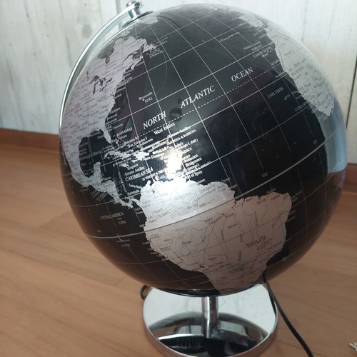 Black and white globe lamp with switch