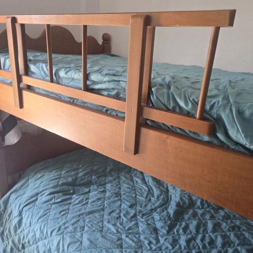 Wooden bunk bed with 2 mattresses like new
