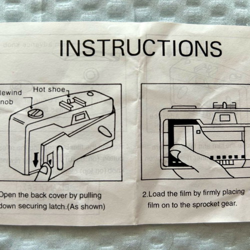 J&B camera new, film operated, with box and manual