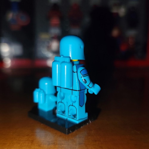 Light Blue Astronaut figure with baby and base, Lepin