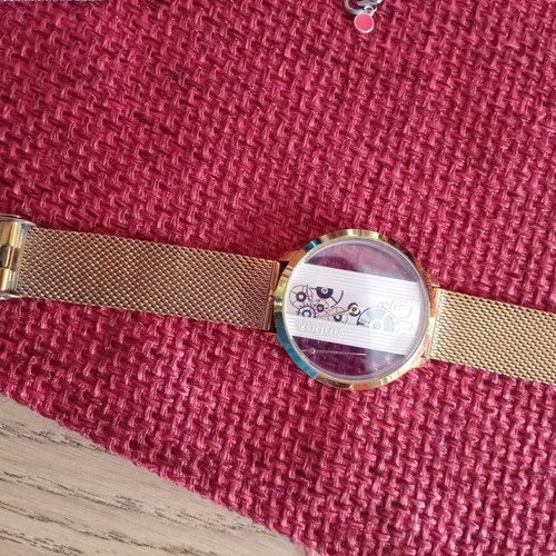 Vogue women's watch like new, gold color