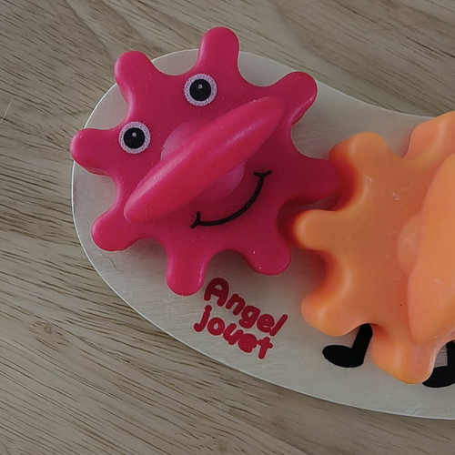 Baby toy with gears like new, wooden base and plastic gears