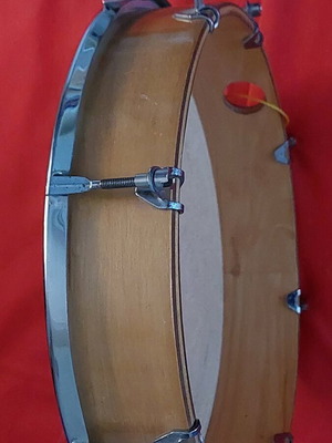 Tambourine for adults used with animal membrane and adjustable tension screws