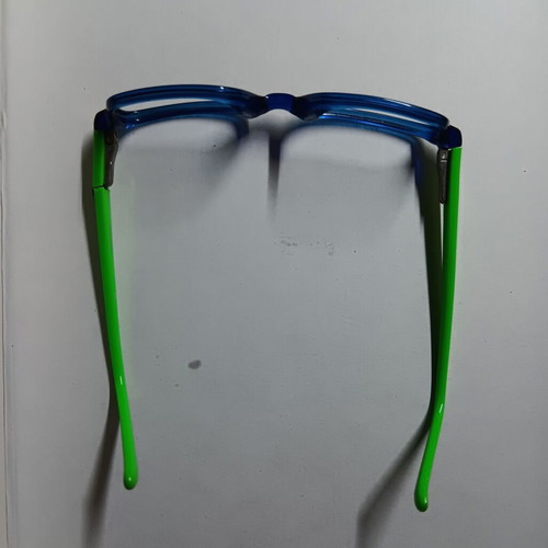 Children's glasses used, green and blue with repaired right arm