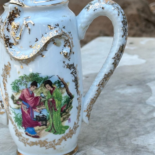 Collectible Japanese Porcelain Coffee Pot used with dragons and traditional scene