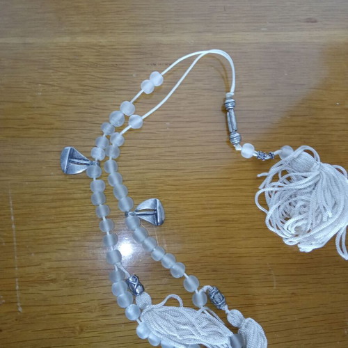 Decorative white worry beads like new