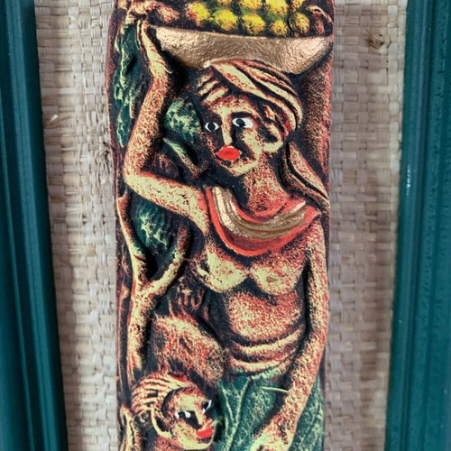 Handmade wooden frames with embossed exotic figures from Bali