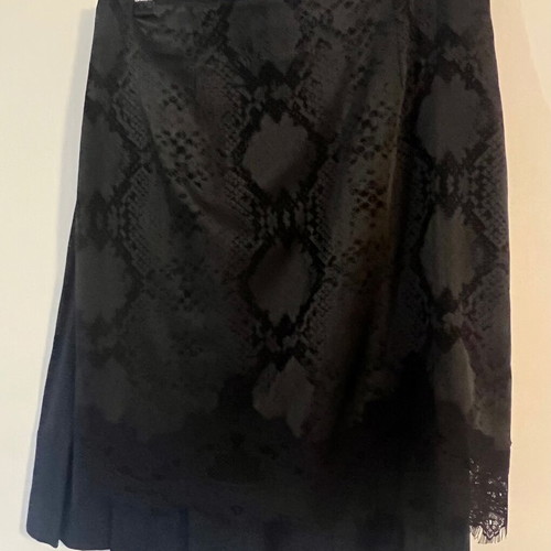 Lauren Vidal short skirt with snake skin pattern and lace trim