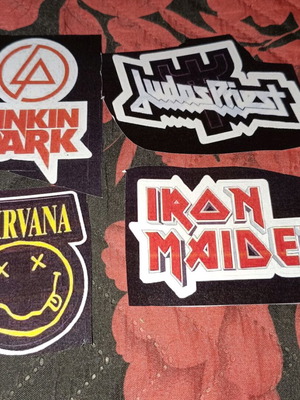 Paper logos from music bands used, not stickers