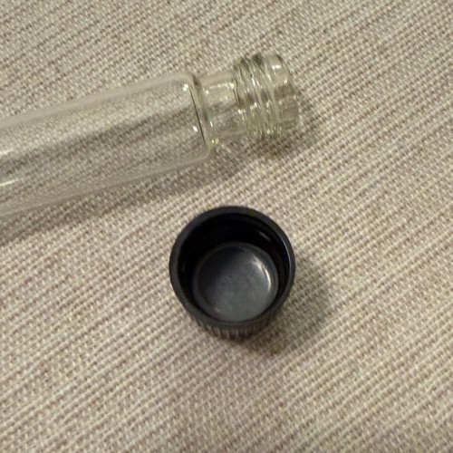 Cylindrical tube like new with secure clasp