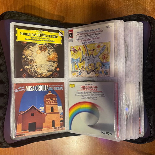 Collection of 64 CDs with carrying case, classical jazz entechno