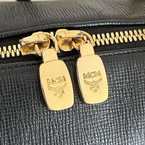 MCM black handbag with gold metal like new